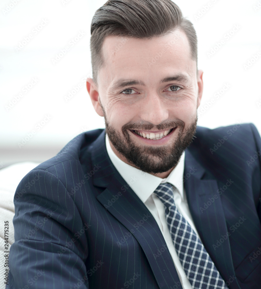 successful businessman sitting in a chair. successful businessman sitting in a chair.