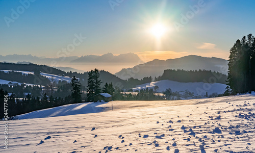 sunset in the Bregenzer Wald area of Vorarlberg, Austria with spectacular view on Mount Saentis, Switzerland