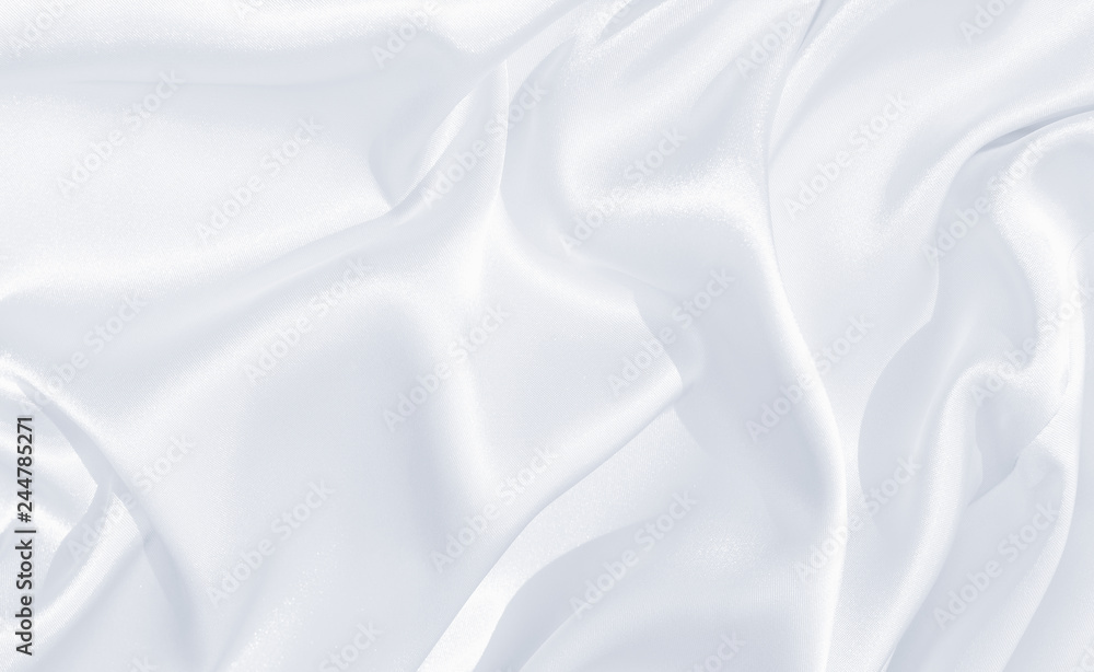 Fototapeta premium The texture of the satin fabric of white color for the background