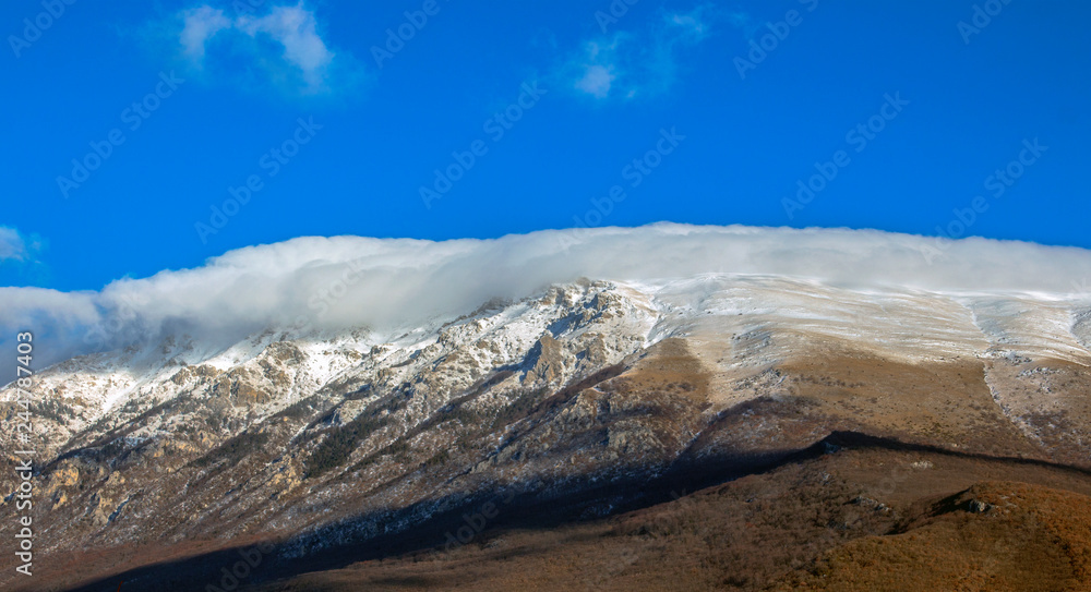 Galichitsa mountain in a cloud collar in winter. Macedonia