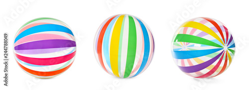 Set of bright inflatable balls on white background. Baby accessories