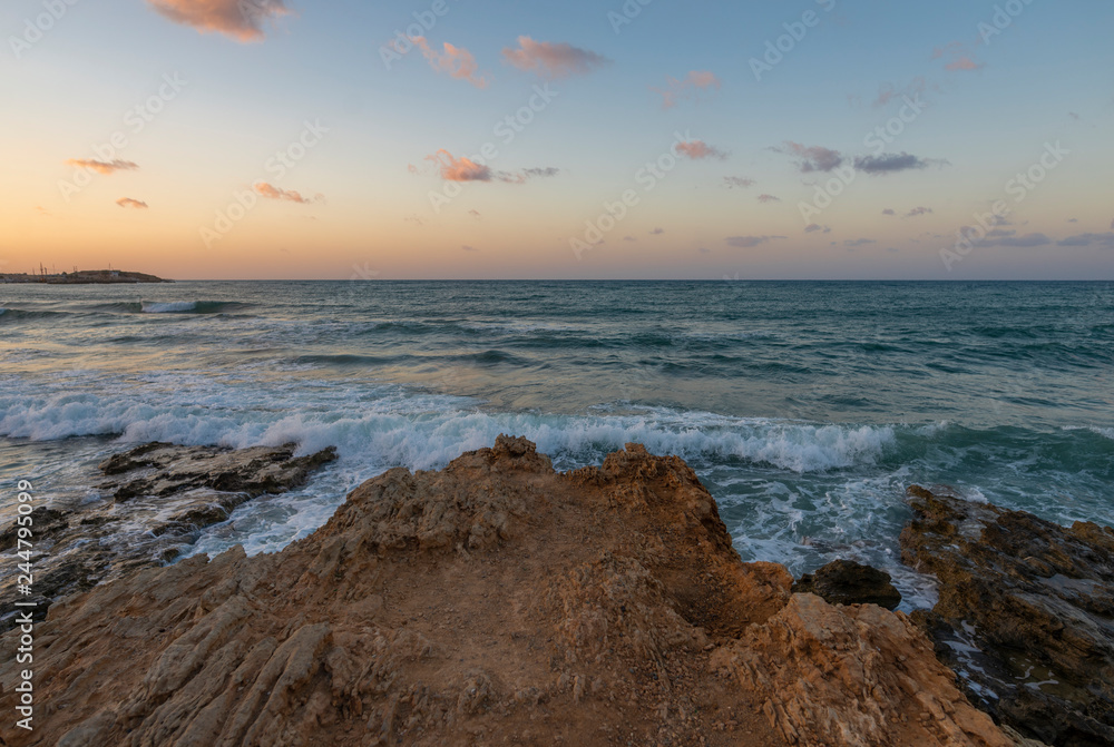 Mediterranean Sea. Greek island Crete. Sunset on the beach