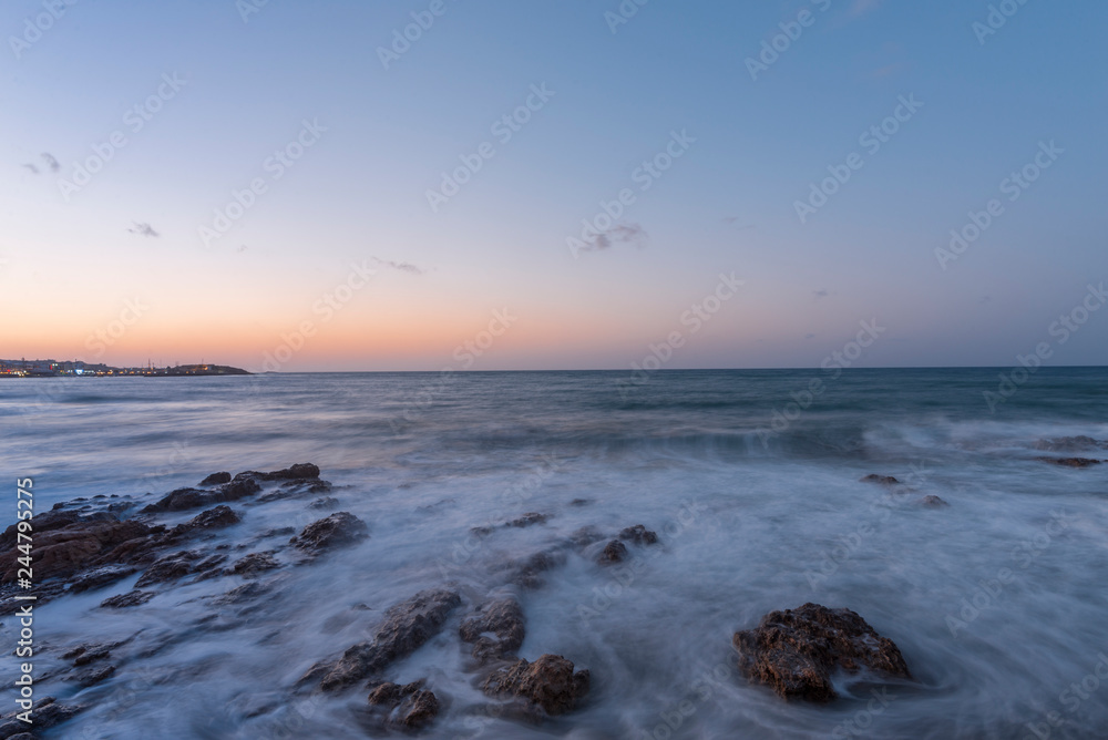 Mediterranean Sea. Greek island Crete. Sunset on the beach.