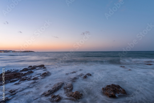 Mediterranean Sea. Greek island Crete. Sunset on the beach. © Inga Av