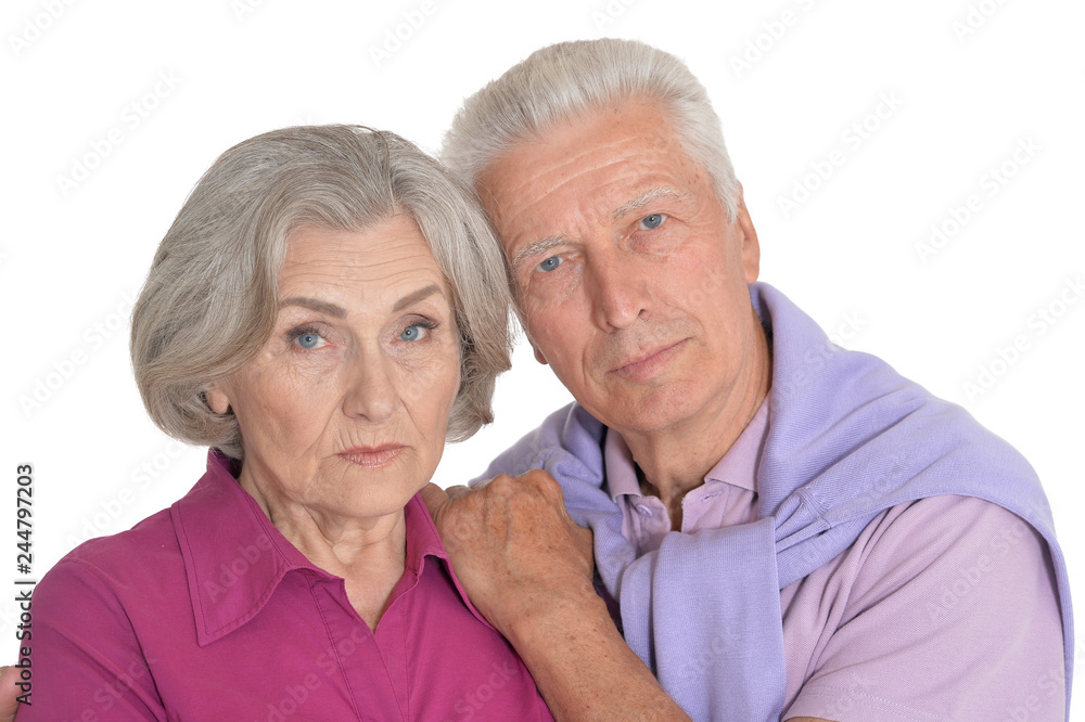 Portrait of sad senior couple on white background Portrait of sad senior couple on white background
