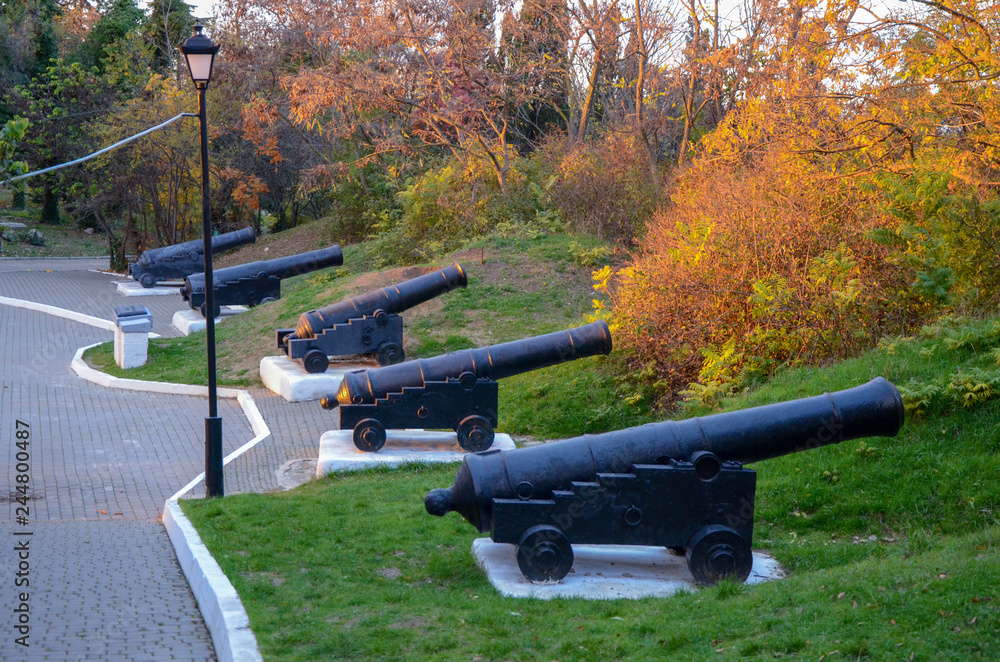 Old war cannon on the Malakoff redoubt in Sevastopol. They belong to the Crimean War of 1853-1856 Old war cannon on the Malakoff redoubt in Sevastopol. They belong to the Crimean War of 1853-1856