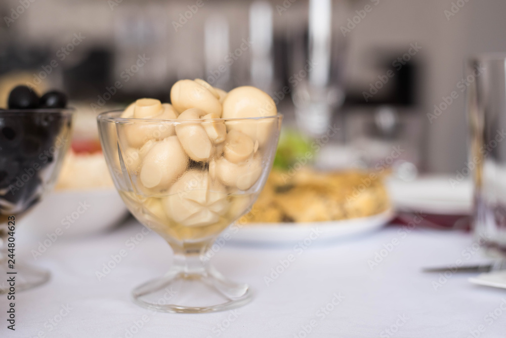 Marinated mushrooms in glass jar Marinated mushrooms in glass jar