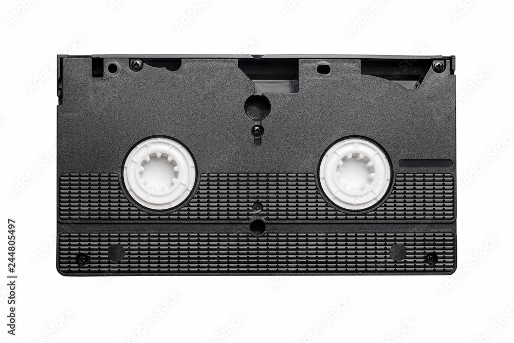 Black vhs tape isolated on white. Outdated technology background. Black vhs tape isolated on white. Outdated technology background.