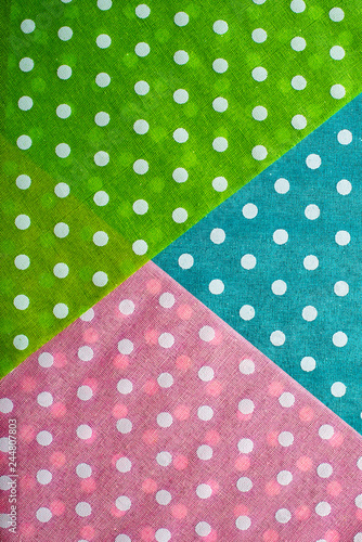 Multi Coloured background on dots. Geometric background on points.