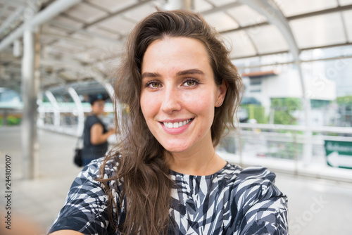 Young woman selfie in the city