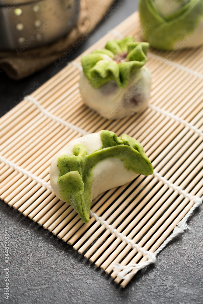 preparing of typical Mongolian meal: Buuz (Steamed Mongolian Dumplings) preparing of typical Mongolian meal: Buuz (Steamed Mongolian Dumplings)