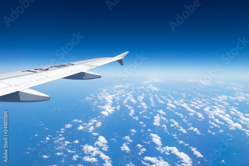 Airplane flying above clouds, Mediterranean Sea