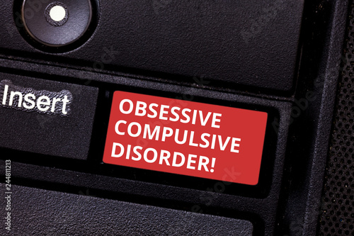 Text sign showing Obsessive Compulsive Disorder. Conceptual photo Person has uncontrollable reoccurring thoughts Keyboard key Intention to create computer message pressing keypad idea photo