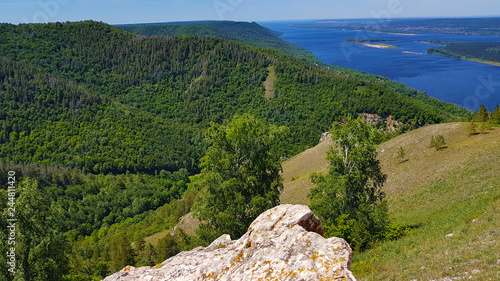 Zhigulevsky State Natural Biosphere Reserve named after I. I.Sprygin, village Zolnoe, Samara Region, Russia. August 12, 2017. View of the Volga River from Mount Strelna at sunset. Height 351 meters photo