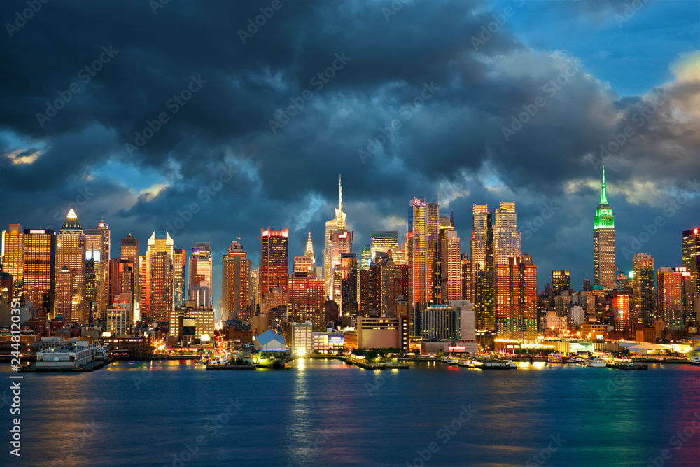 New York City Midtown Manhattan skyline at dusk over Hudson River