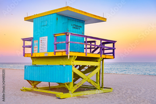 Famous lifeguard tower at South Beach in Miami at sunset © kmiragaya