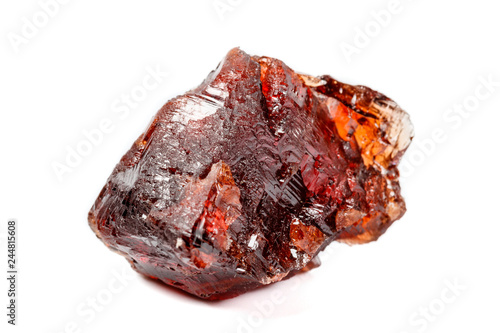 Macro mineral stone Garnet Spessartine on a white background