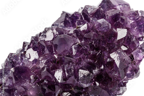 Macro mineral stone Amethysts eye crystals on white background