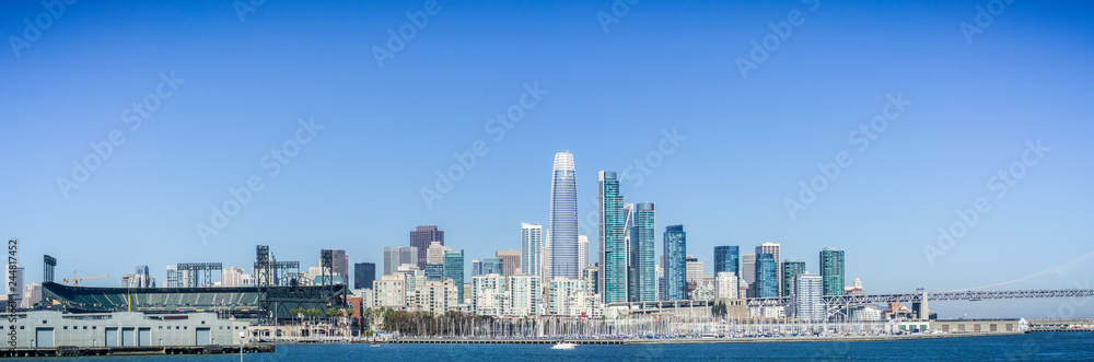 San Francisco's Financial District new skyline as seen from the waterfront on a sunny and clear day San Francisco's Financial District new skyline as seen from the waterfront on a sunny and clear day