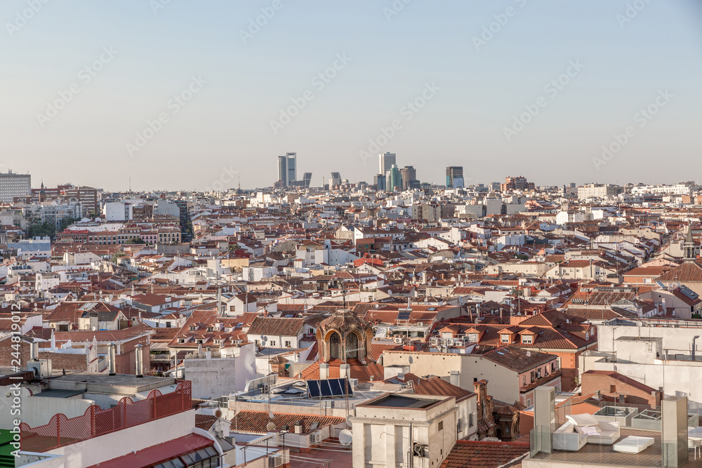 Top view of part of the city of Madrid where classic and modern buildings are mixed