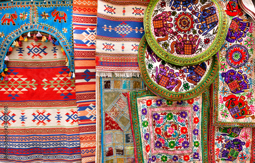 Ethnic patterns and traditional colors on old style cotton handmade blankets. Patterns on texture of vintage carpets of Morocco or south Europe