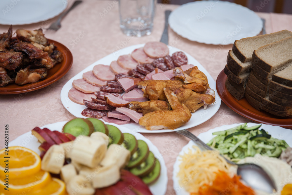 meat plate at the festive table at a celebration meat plate at the festive table at a celebration