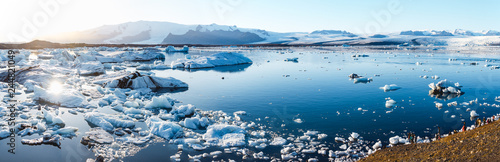 Spectacular glacial lagoon in Iceland with floating icebergs photo