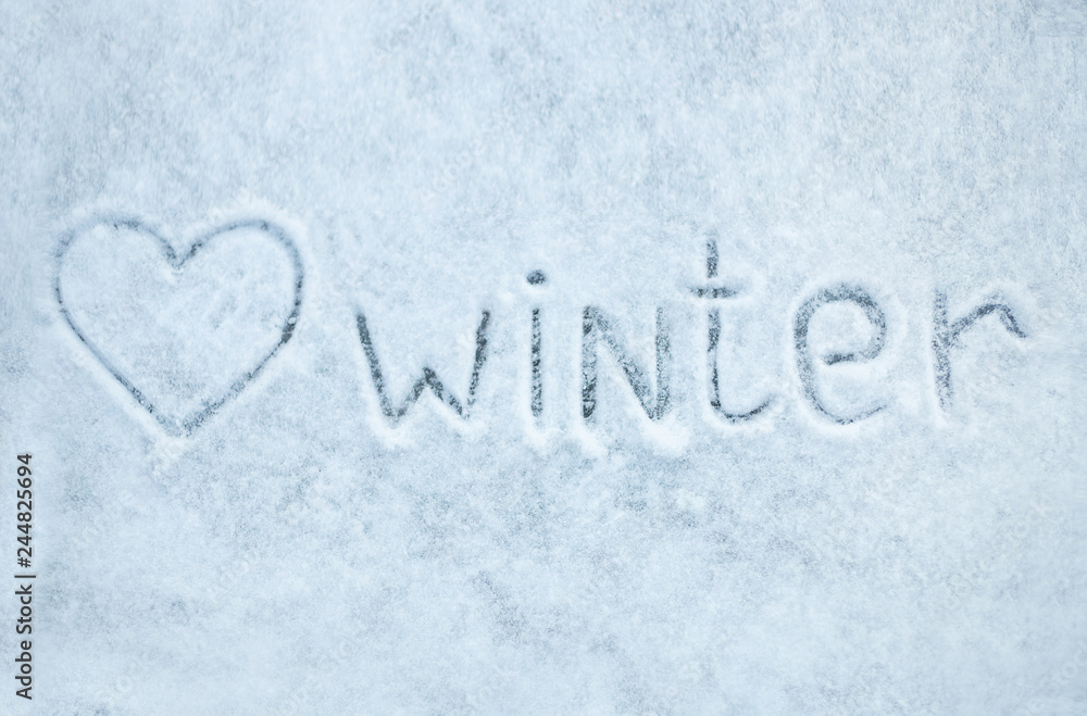 Top view of the English inscription on ice with fresh snow: Top view of the English inscription on ice with fresh snow: