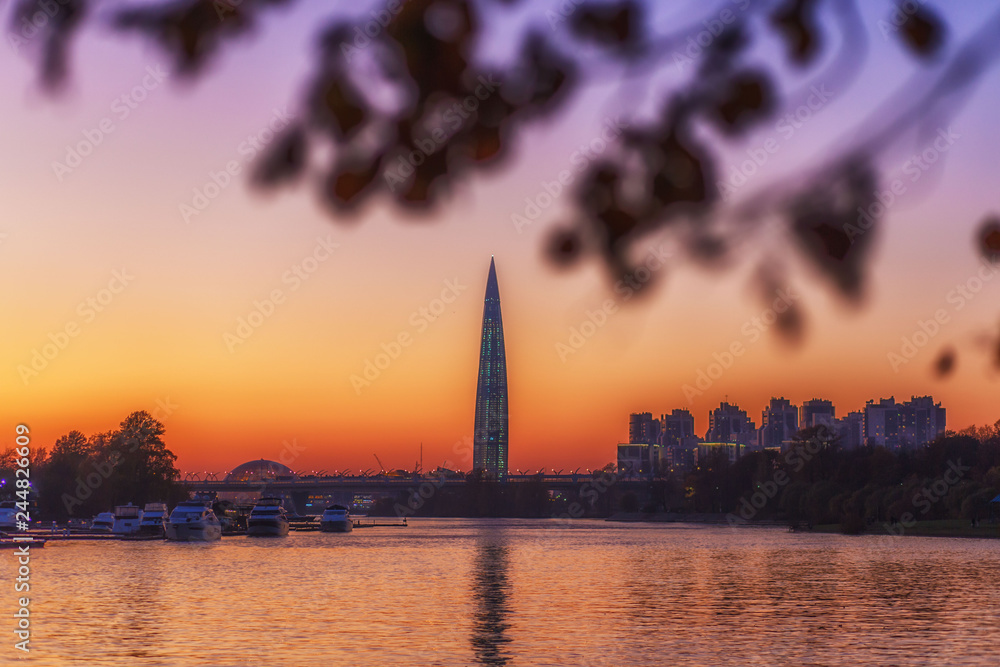 modern high skyscraper at autumn at the sunset