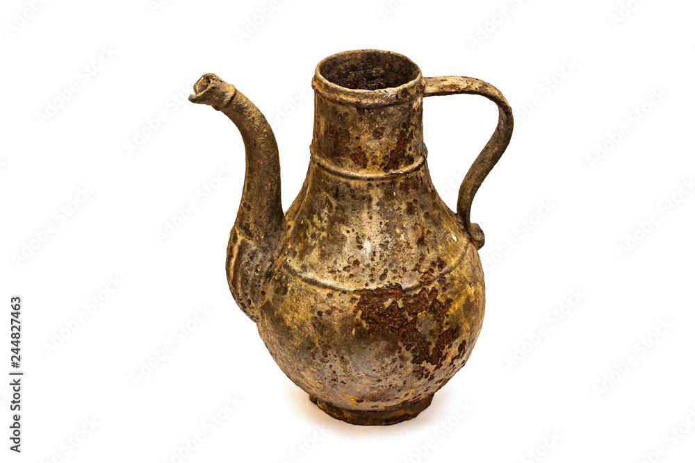 Beautiful vintage cast iron jug on white isolated background