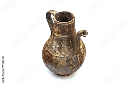 Beautiful vintage cast iron jug on white isolated background © Torkhov
