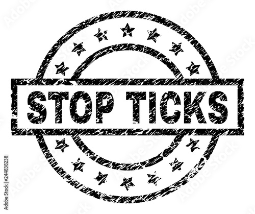 STOP TICKS stamp seal watermark with distress style. Designed with rectangle, circles and stars. Black vector rubber print of STOP TICKS text with corroded texture.