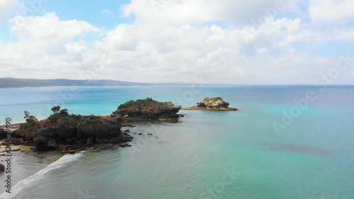 Aerial shot of islands at walkerville Victoria and beautiful vivid blue ocean waters. photo