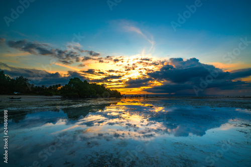 Beach with sunset background