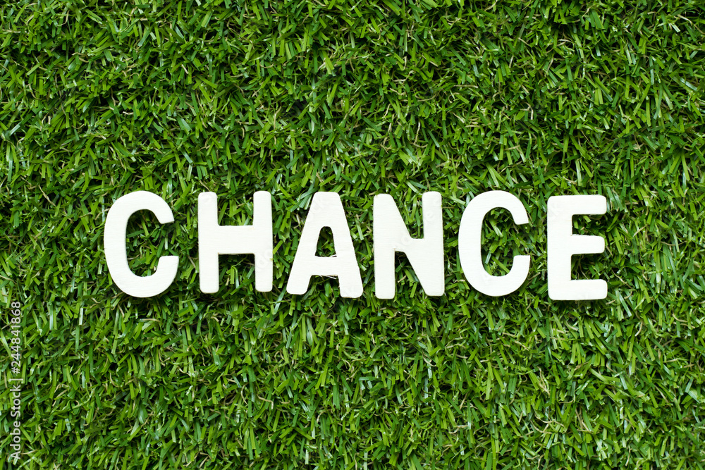 Alphabet letter in word chance on artificial green grass background