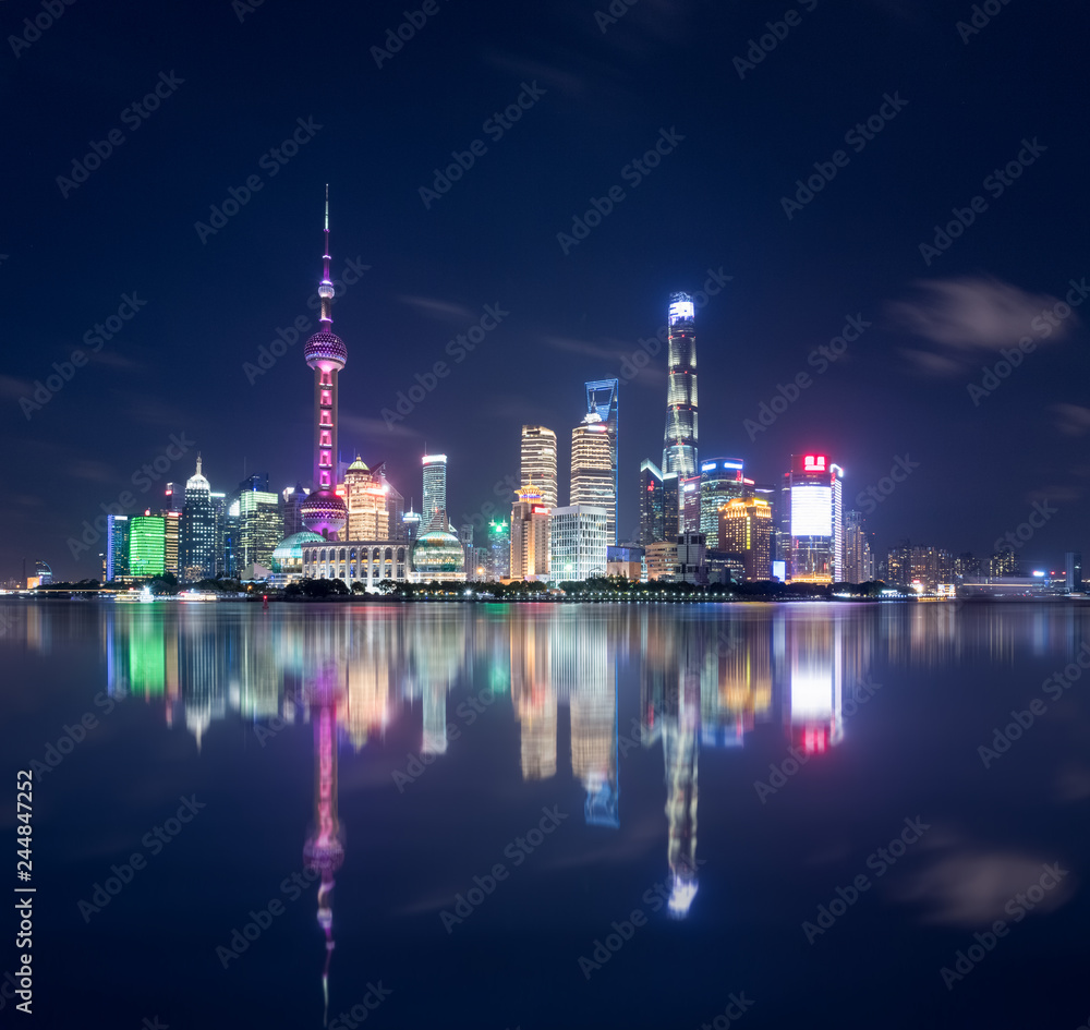 beautiful shanghai skyline and reflections