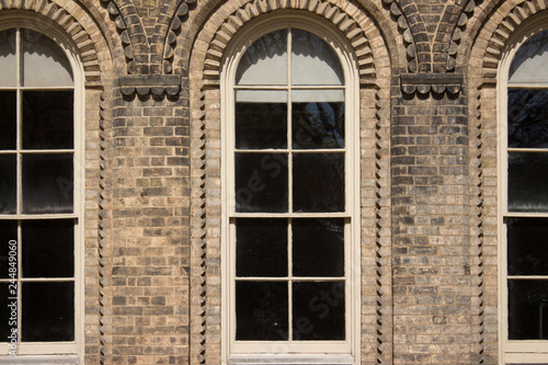 Arched Windows in a Brick Wall