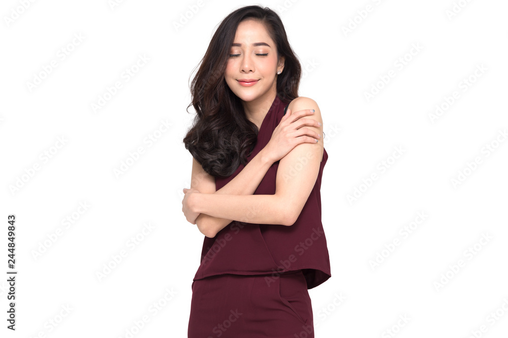 Happy young casual asian woman hugging herself isolated on white background. Love yourself concept Happy young casual asian woman hugging herself isolated on white background. Love yourself concept