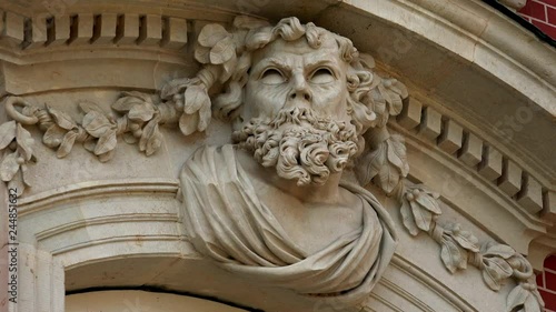 Beautiful stucco, a bas-relief on the facade of an old palace. Potsdam, Germany. 4K.