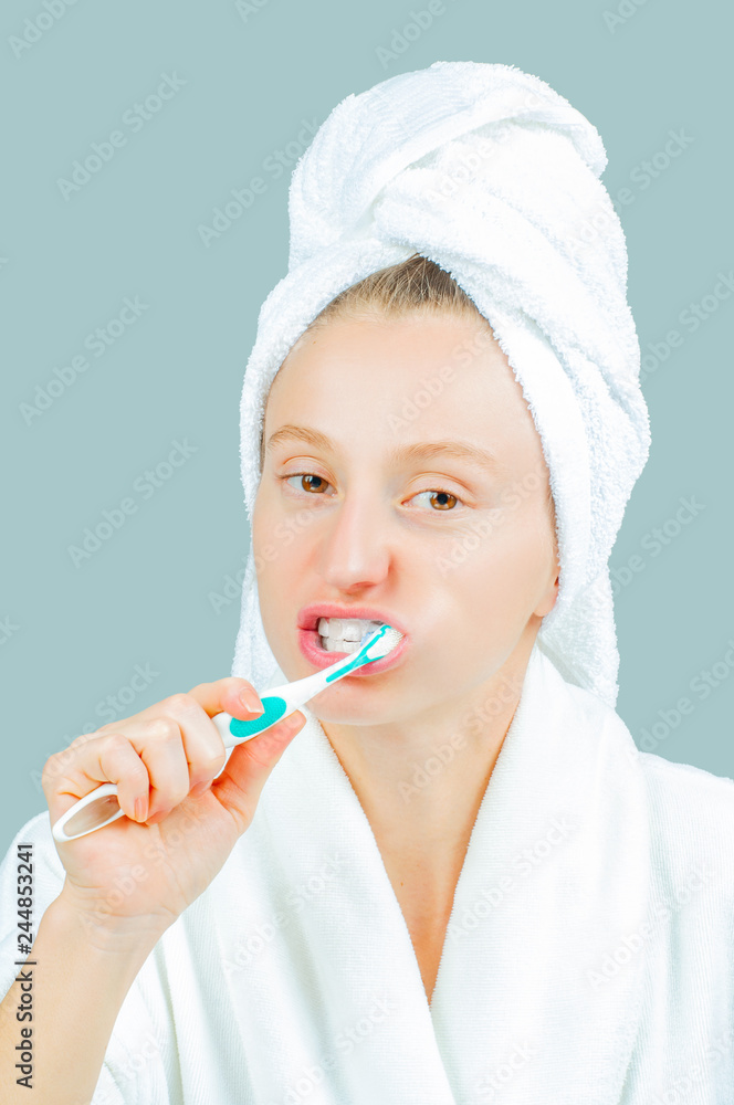 Spa and beauty concept. Beautiful woman brushing teeth. Spa and beauty concept. Beautiful woman brushing teeth.