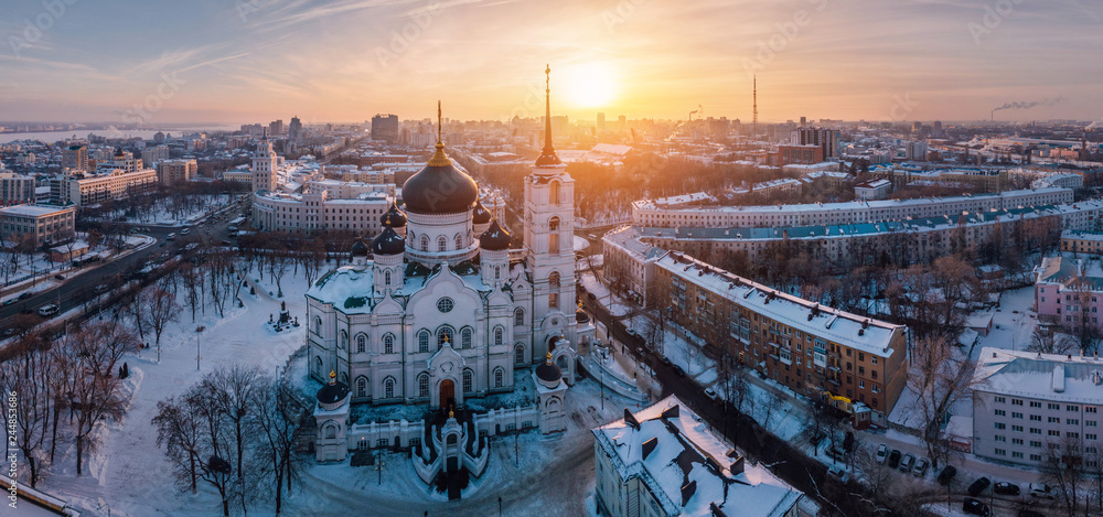 Evening winter Voronezh panoramic cityscape. Tower of management of south-east railway and Annunciation Cathedral at  sunset 