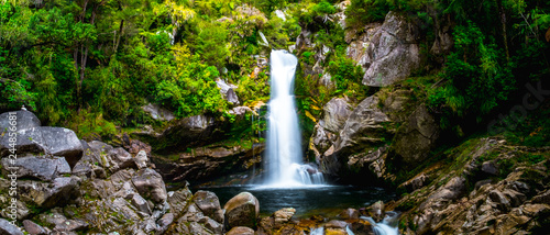 Beautiful waterfalls in the green nature, Wainui Falls, Abel Tasman, New Zealand. photo
