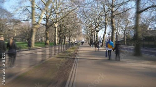 Wallpaper Mural Time lapse. People walking on a pedestrian road near a park. Torontodigital.ca