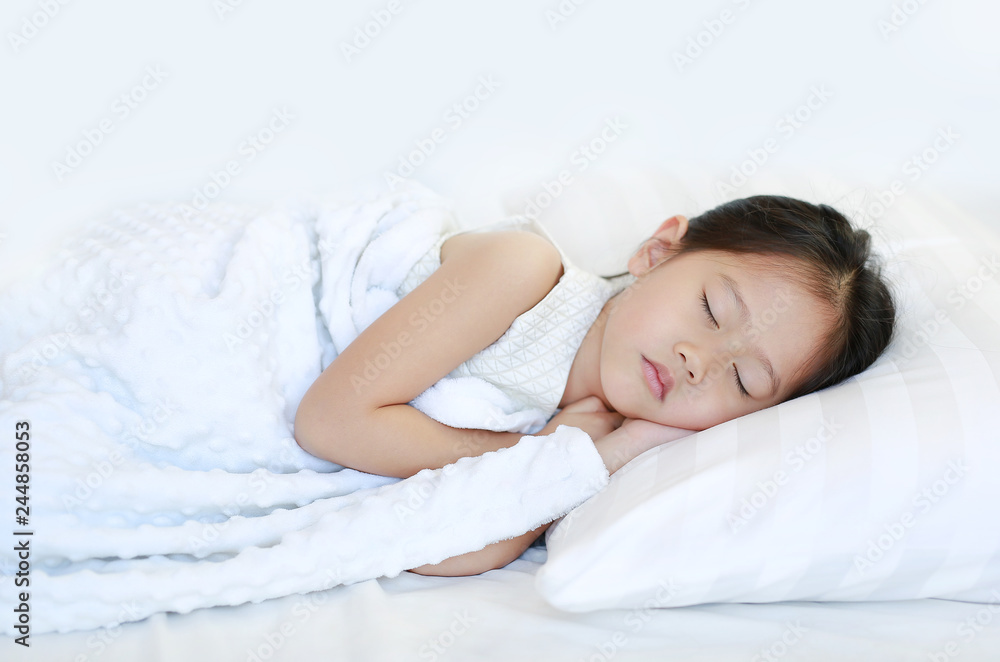 Sleeping beautiful Asian child girl lying on bed. Sleeping beautiful Asian child girl lying on bed.