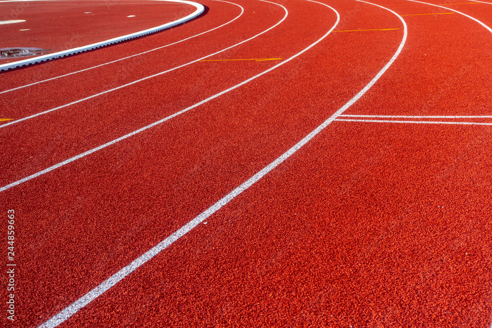 Fototapeta premium Red running track in stadium