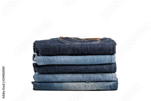 Stack of jeans isolated on white background.