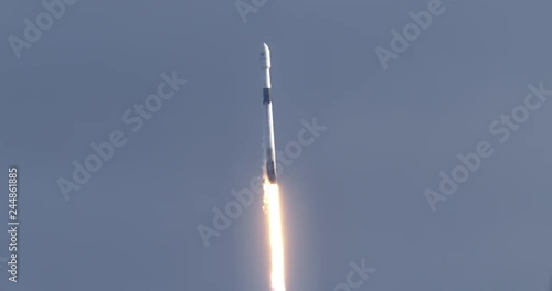 Space Rocket launches in daytime from Kennedy Space Center, 4K video at 120 fps slow motion.  With audio. photo