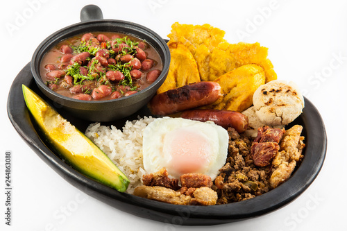 Traditional Colombian dish called Banda paisa: a plate typical of Medellin that includes meat, beans, egg and plantain photo