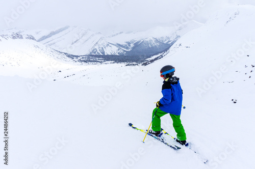 Young Skier on top of Mountain at Lake Louise in the Canadian Rockies