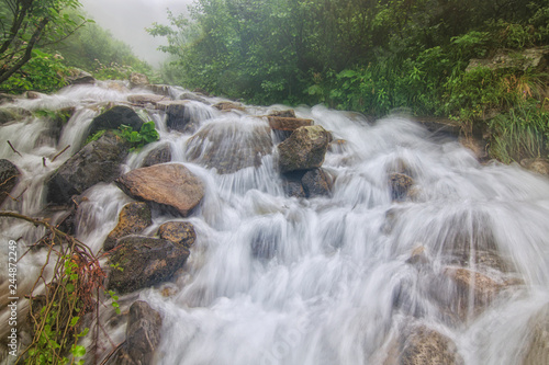 The spring floods on the river Dzembronya, which in the Ukrainian Carpathians, form small waterfalls.